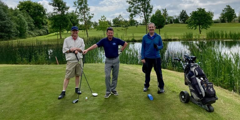 golfers-by-lake